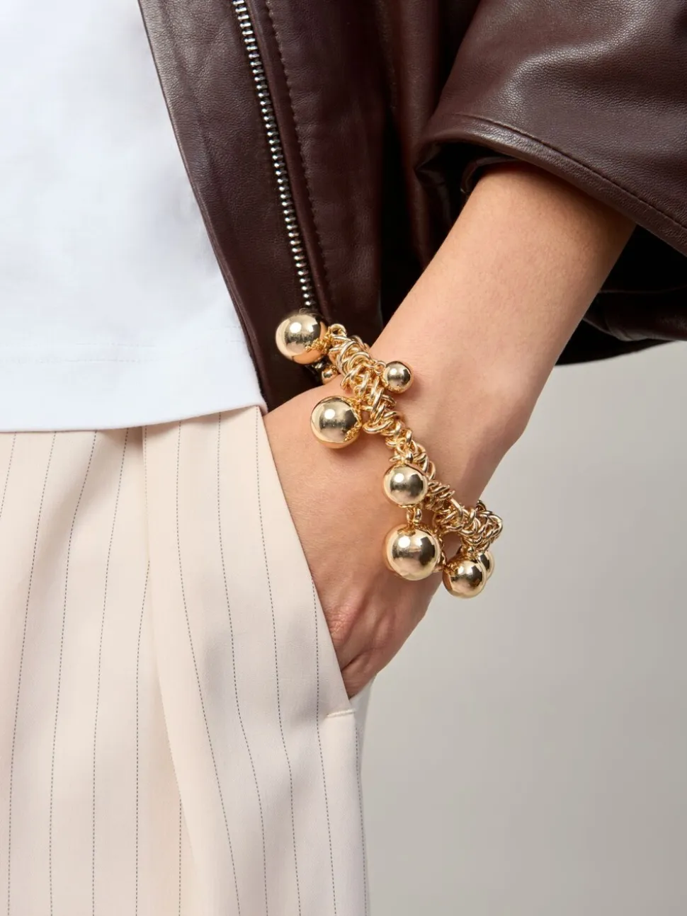 Aela Gold Tone Statement Sphere Cluster Stretch Bracelet