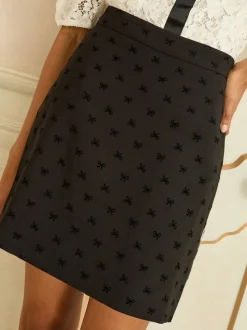 Black Flocked Bow Print - Love & Roses Mini Skirt