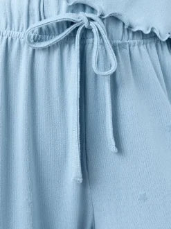 Blauw met sterrenprint - Zachte pyjama met lange mouwen en hartjesprint