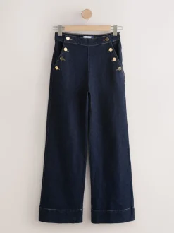 Blauw met wassing - Jeans met wijde pijpen en gouden knopen aan de voorkant