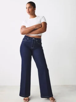 Blauw met wassing - Jeans met zandloperpasvorm en wijde pijpen