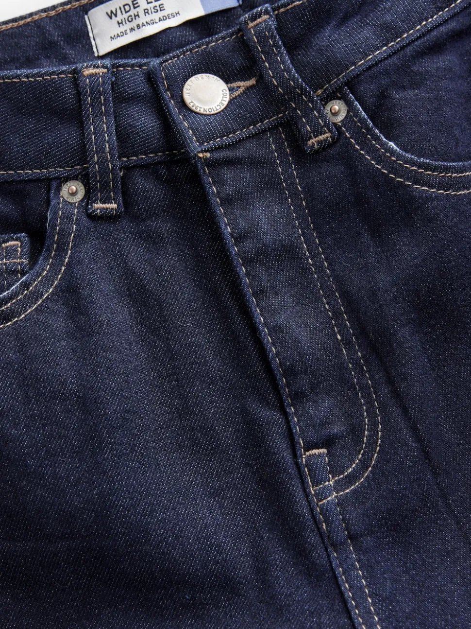 Blauw met wassing - Jeans met zandloperpasvorm en wijde pijpen