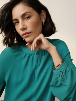 Blauwgroen - Blouse met V-hals en lange mouwen