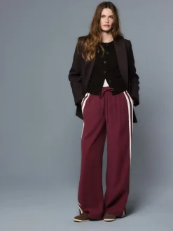 Bordeauxrood - Wijduitlopende broek met streep langs de zijkanten