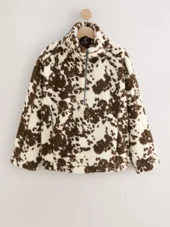 Bruin met koeprint - Borg fleece met korte rits