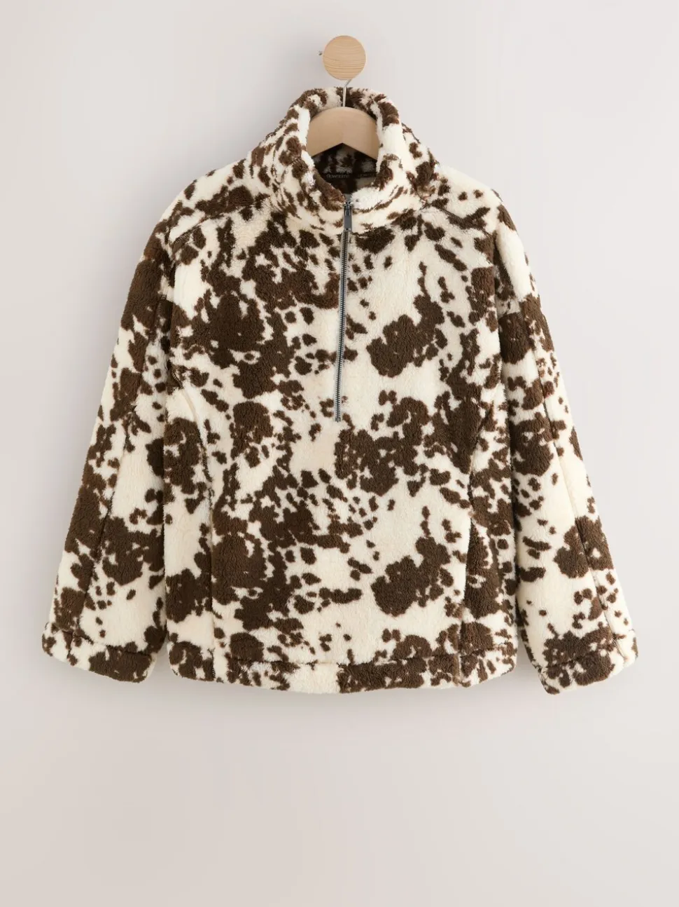 Bruin met koeprint - Borg fleece met korte rits