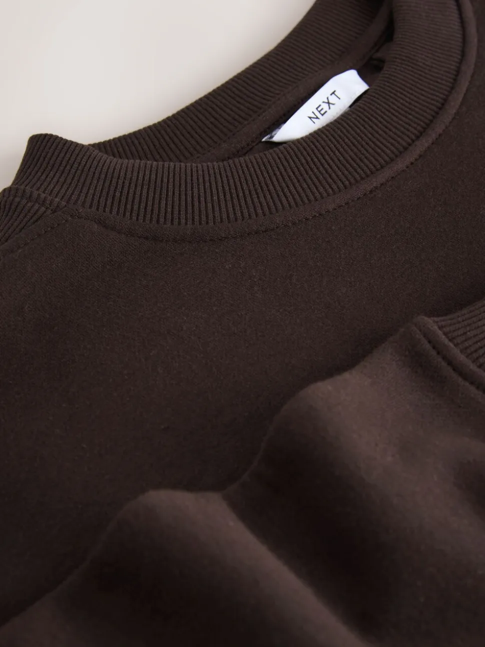 Chocoladebruin - Essentials sweatshirt met relaxte pasvorm, lange snit en zakken