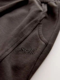 Chocoladebruin - self. Barrell Leg Joggers
