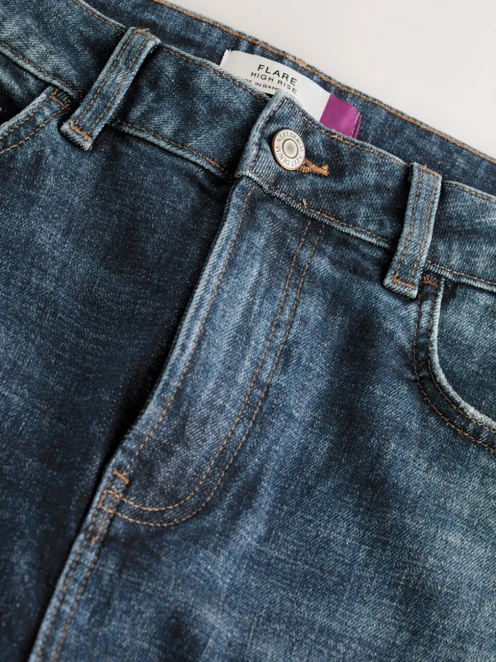 Donkerblauw - Stretch jeans met uitlopende pijpen en hoge taille