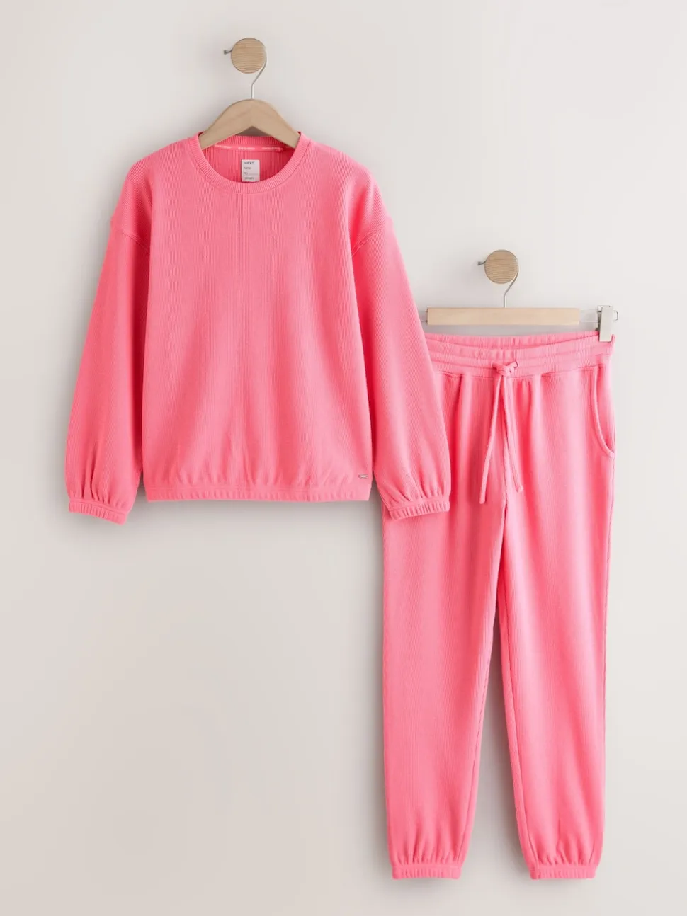 Felroze - Gezellige pyjama met wafeldessin en lange mouwen