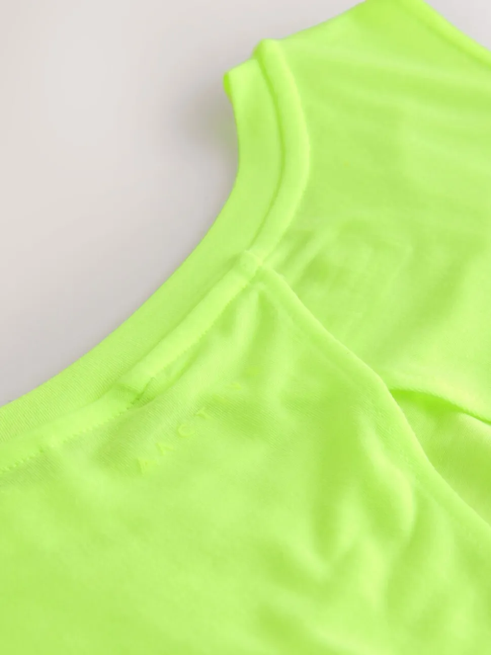 Fluoriserend groen - Actieve lichtgewicht open rug tanktop