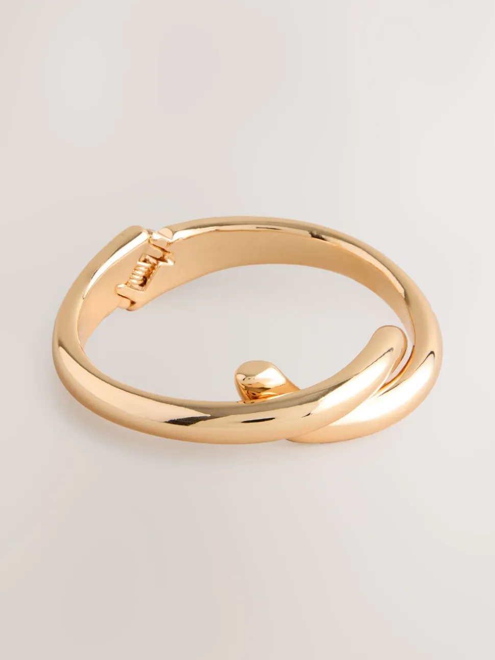 Goudkleurig - Cross-Over Hinge Bangle