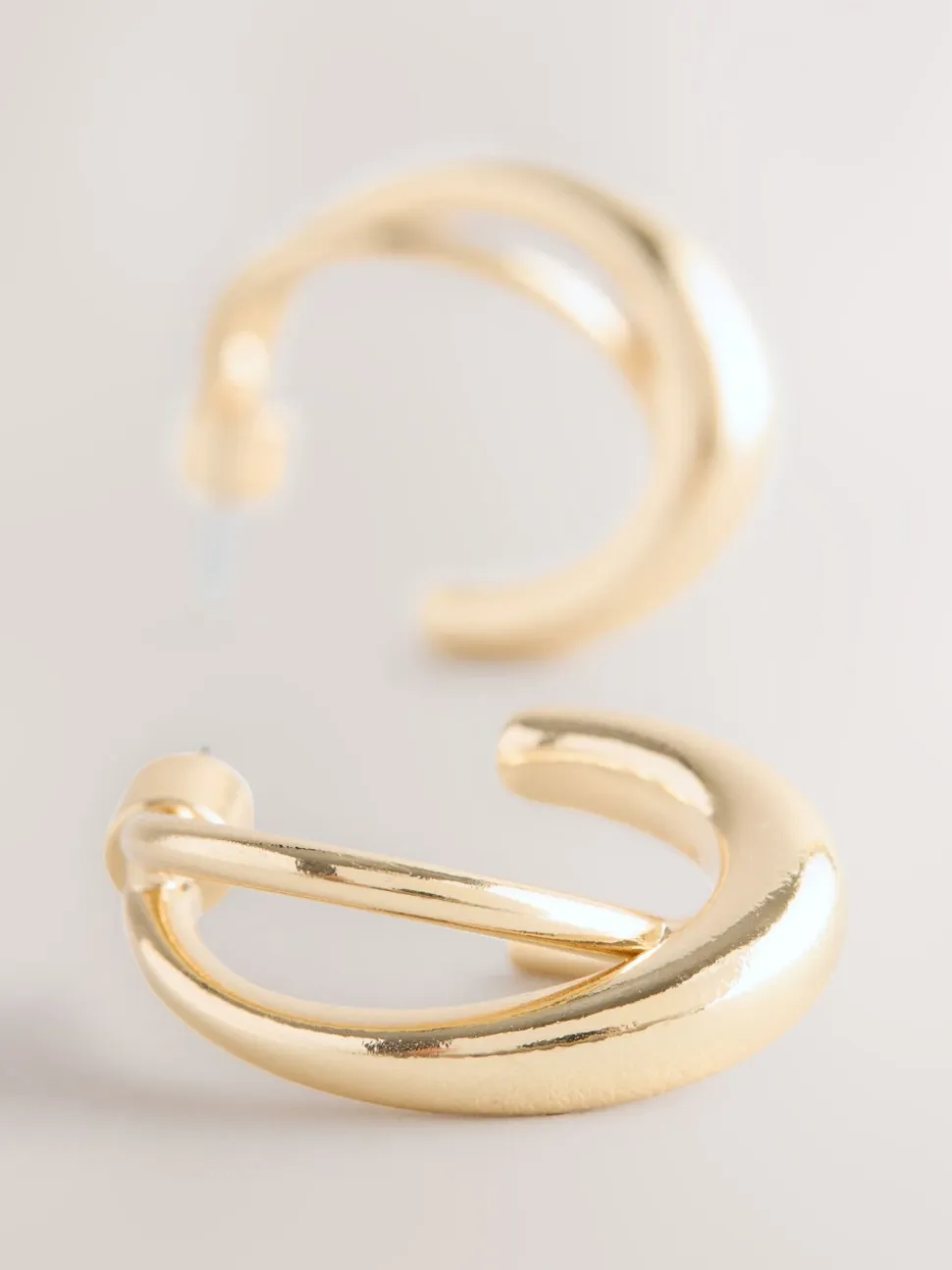 Goudkleurig - Gekruiste oorringen
