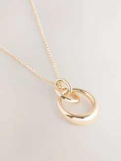 Goudkleurig - Ketting met hangertje van vereende ringen