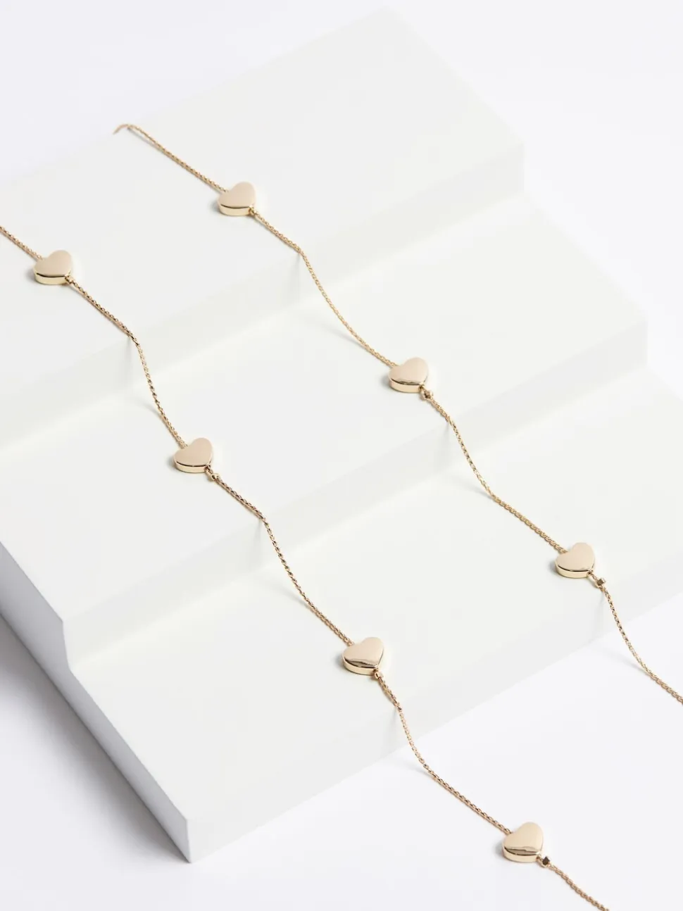 Goudkleurig - Lange draadketting met hartje