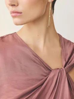 Goudkleurig - Oorbellen met glitterdetail