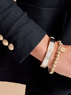 Goudkleurige armband met embleem