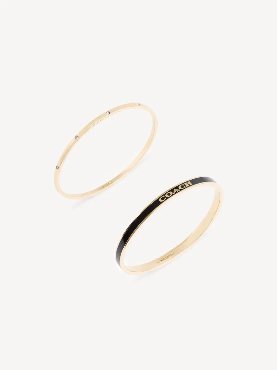 Goudkleurig/zwart - COACH COACH goudkleurige Signature Duo Bangle set in doosje