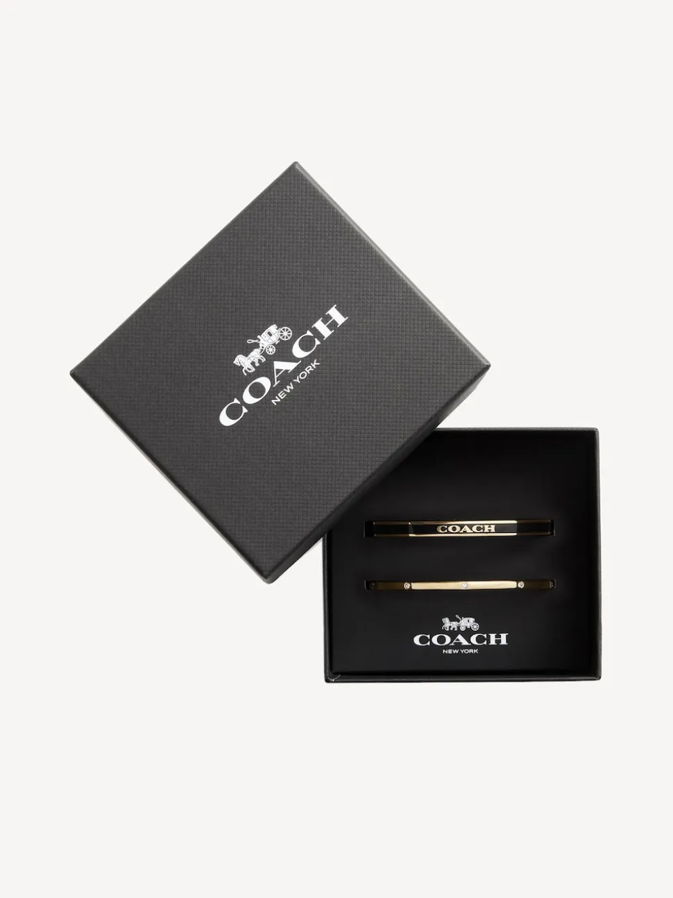 Goudkleurig/zwart - COACH COACH goudkleurige Signature Duo Bangle set in doosje