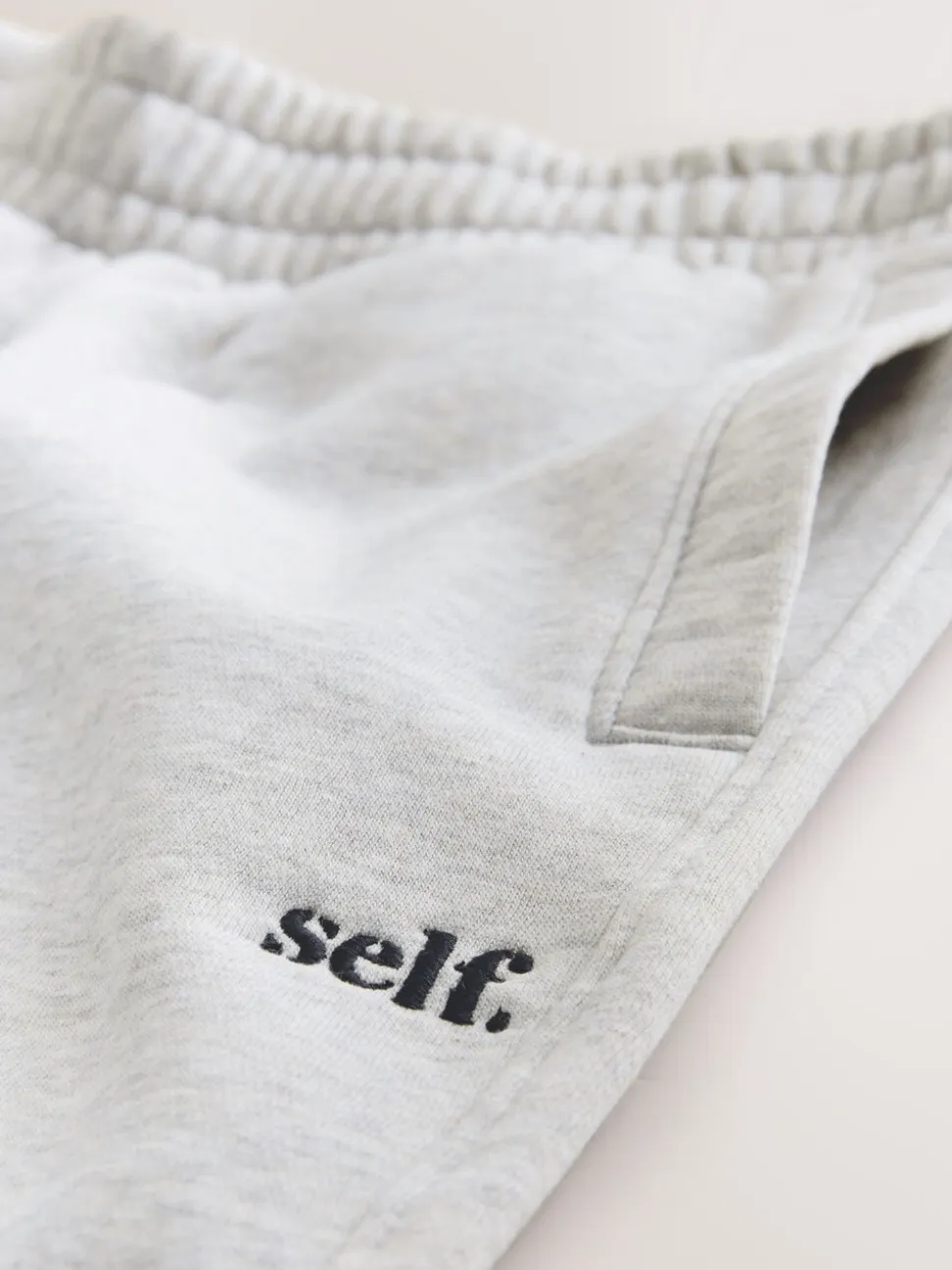 Grijs - self. joggingbroek met wijde pijpen