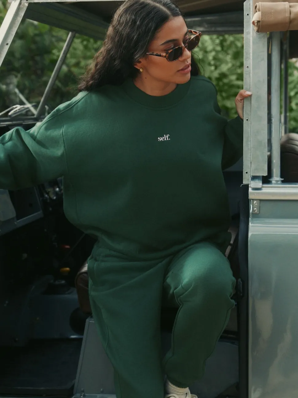 Groen - Self. joggingbroek met boorden