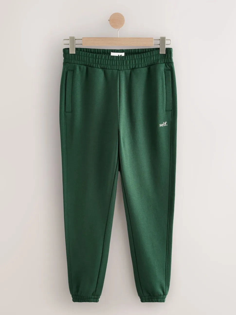 Groen - Self. joggingbroek met boorden