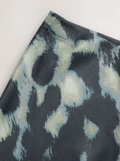 Groen met dierenprint - Satijnen midirok