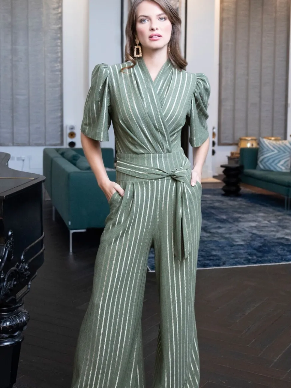 Hot Squash groene jumpsuits met wijde pijpen en gouden strepen