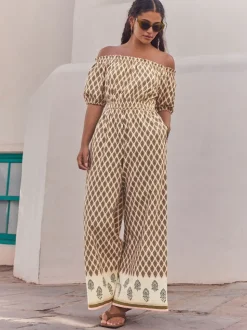 Kakigroen - Jumpsuit met blote schouders en wijde pijpen van 100% katoen