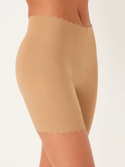 Licht beige - Buik- en dijcorrigerende slip met geschulpte rand