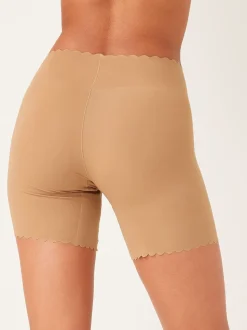 Licht beige - Buik- en dijcorrigerende slip met geschulpte rand