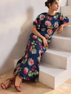Marineblauw met bloemenprint - Midi-jurk met print en pofmouwen