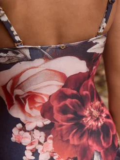 Marineblauw met bloemenprint - Vormgevend bandeaubadpak met buikcorrectie