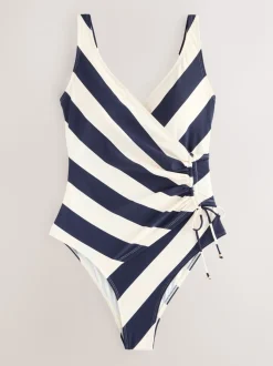 Marineblauw/crèmekleurig - Badpak met vormgevende zijrimpeling en buikcorrectie
