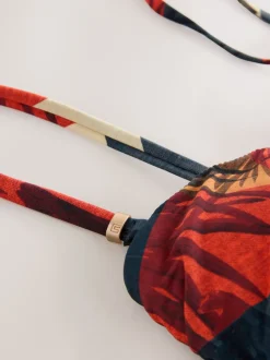 Marineblauw/oranje met palmprint - Vormgevend bandeaubadpak met buikcorrectie