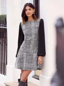 Monochroom - Friends Like These Boucle Peplum Hem Mini Dress
