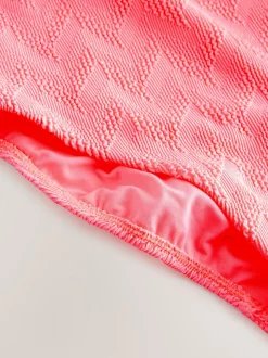 Neon koraalroze met textuur - Buikbedekkend badpak met ruime ronde hals