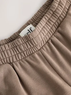 Nertsgrijs/bruin - self. joggingbroek met wijde pijpen