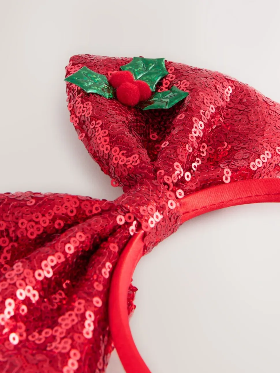 Rood - Haarband met kerststrik met pailletten