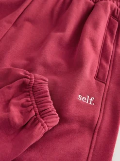 Rood - Self. joggingbroek met boorden
