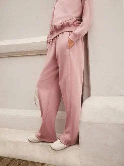 Roze - self. joggingbroek met wijde pijpen