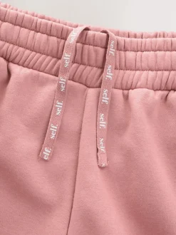 Roze - self. joggingbroek met wijde pijpen