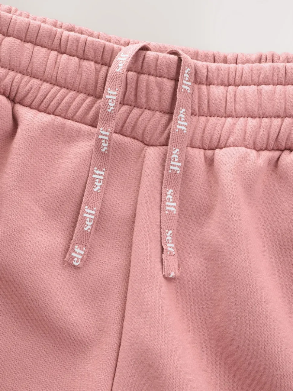 Roze - self. joggingbroek met wijde pijpen