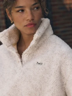 self. Buttons Neck Jumper