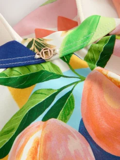Vrolijk fruit/tropische print - Vormgevend badpak met buikcorrectie