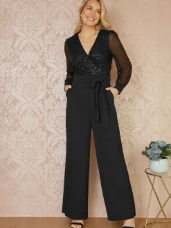 Yumi - Jumpsuit met lovertjes en lange mouwen