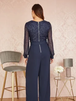 Yumi - Jumpsuit met lovertjes en lange mouwen