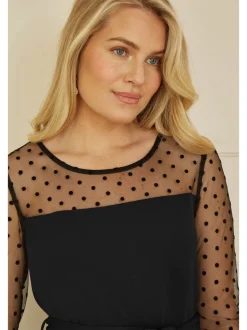 Yumi jumpsuit met stippen van stretch gaas