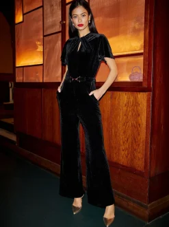 Yumi Velvet Jumpsuit With Twist Neckline And Buckle Belt
