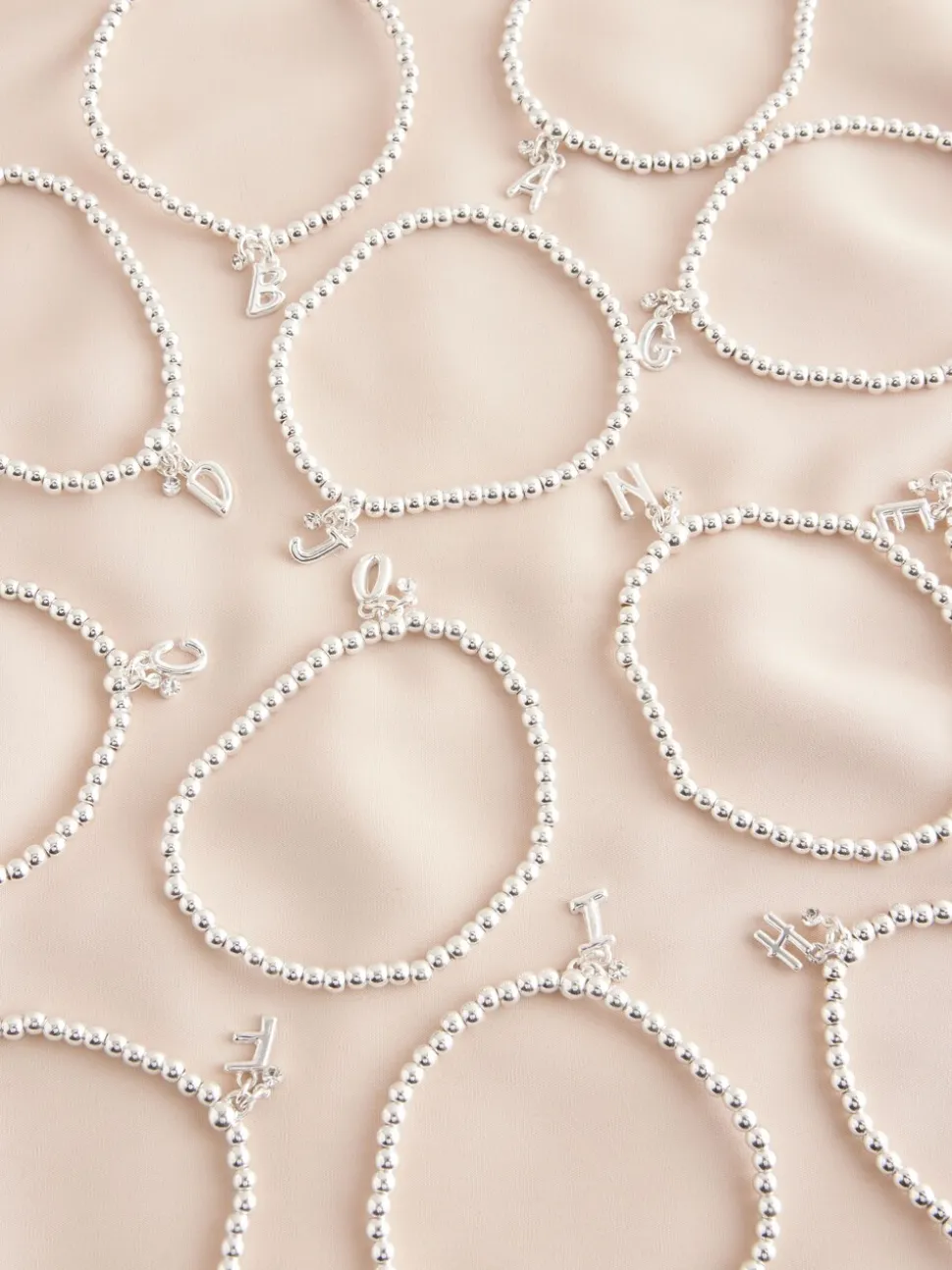 Zilverkleurig - Letterarmband met stretch